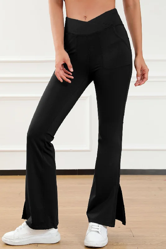 Black Cross Waist Pocketed Split Hem Flared Leggings Trendy Sports Performance Leggings